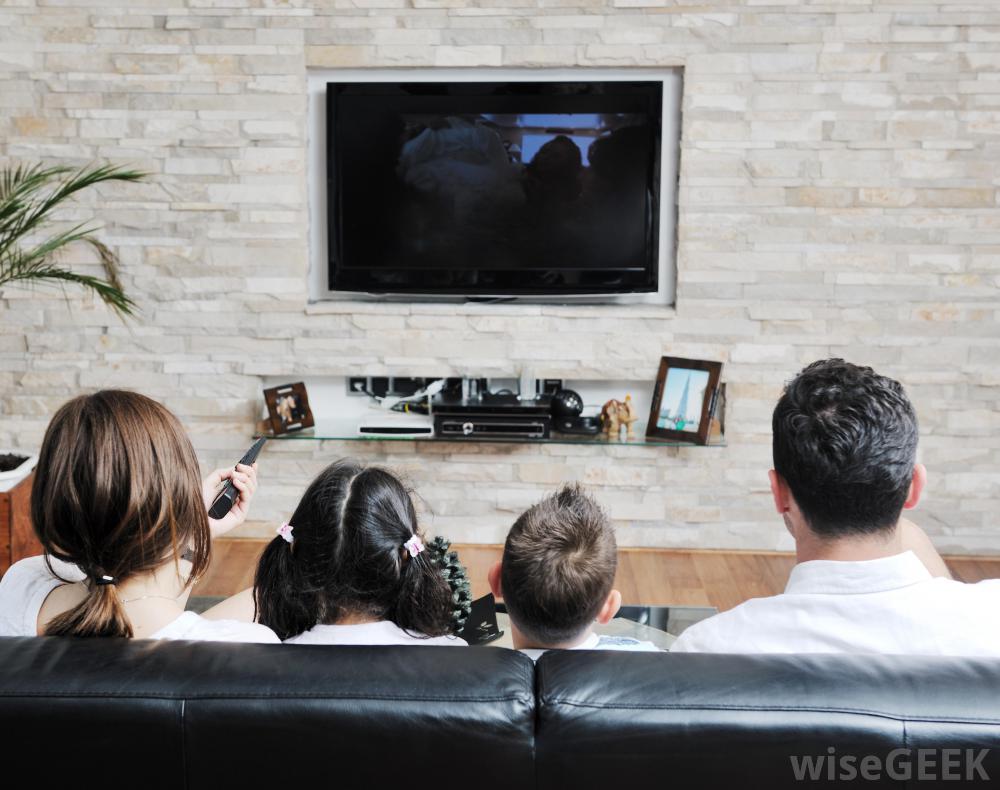 family-on-couch-watching-television